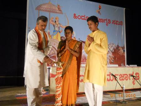Left: Sri Y.Divakar Bhat, Ms Sphoorthi Benakanavari, Mr Mohan Gowda while lighting Holy Lamp